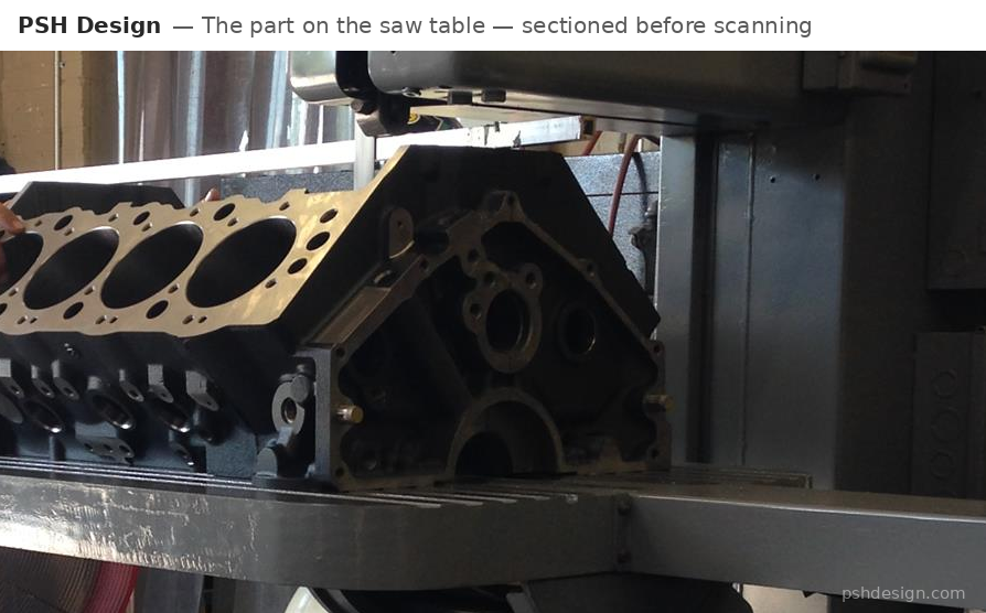 An engine block sectioned on a band saw before 3D scanning, at a customer shop.